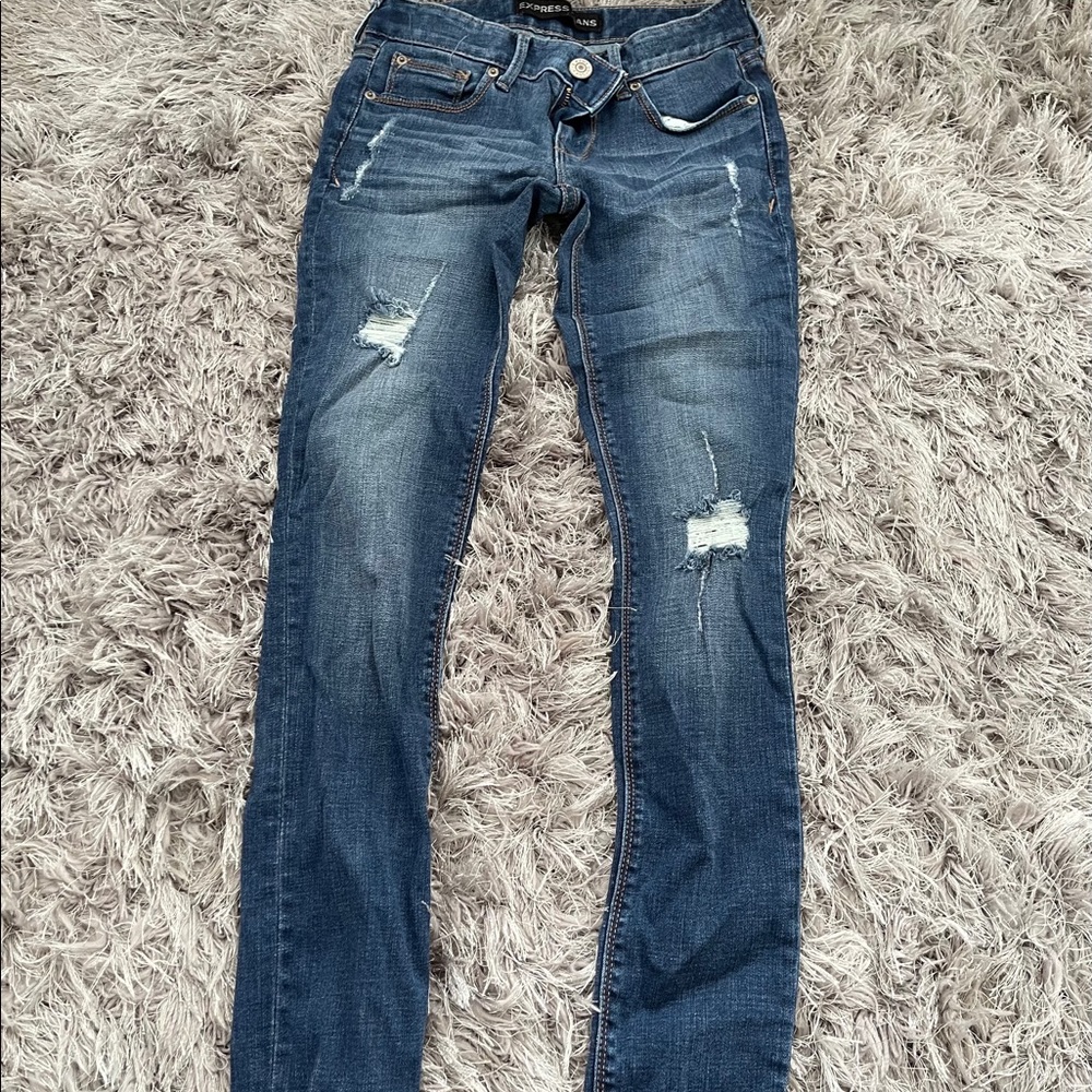 Euc Express low rise stretch 00 ripped jeans
